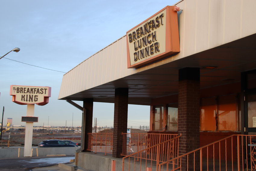 A view from the parking lot of the Breakfast King at Santa Fe Drive and Mississippi Avenue, a staple of late-night food in Denver that permanently closed amid the pandemic.